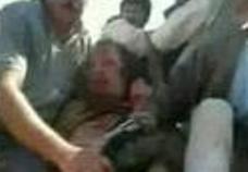 il cadavere di Gheddafi